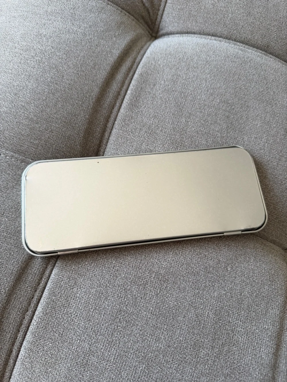 Calvin Klein silver CK One rectangular tin